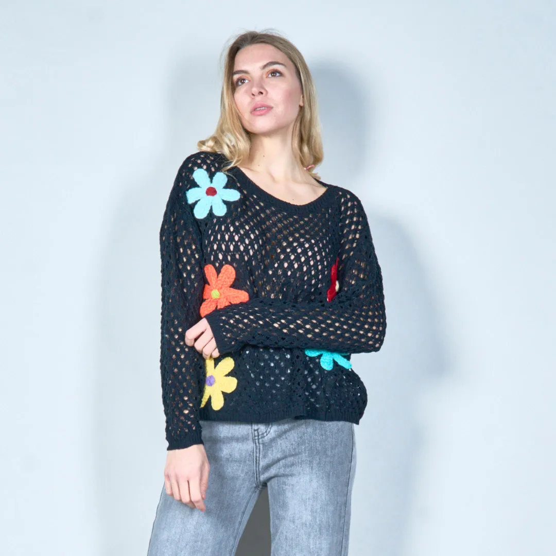 Open-knit sweater with colorful floral applique wholesale