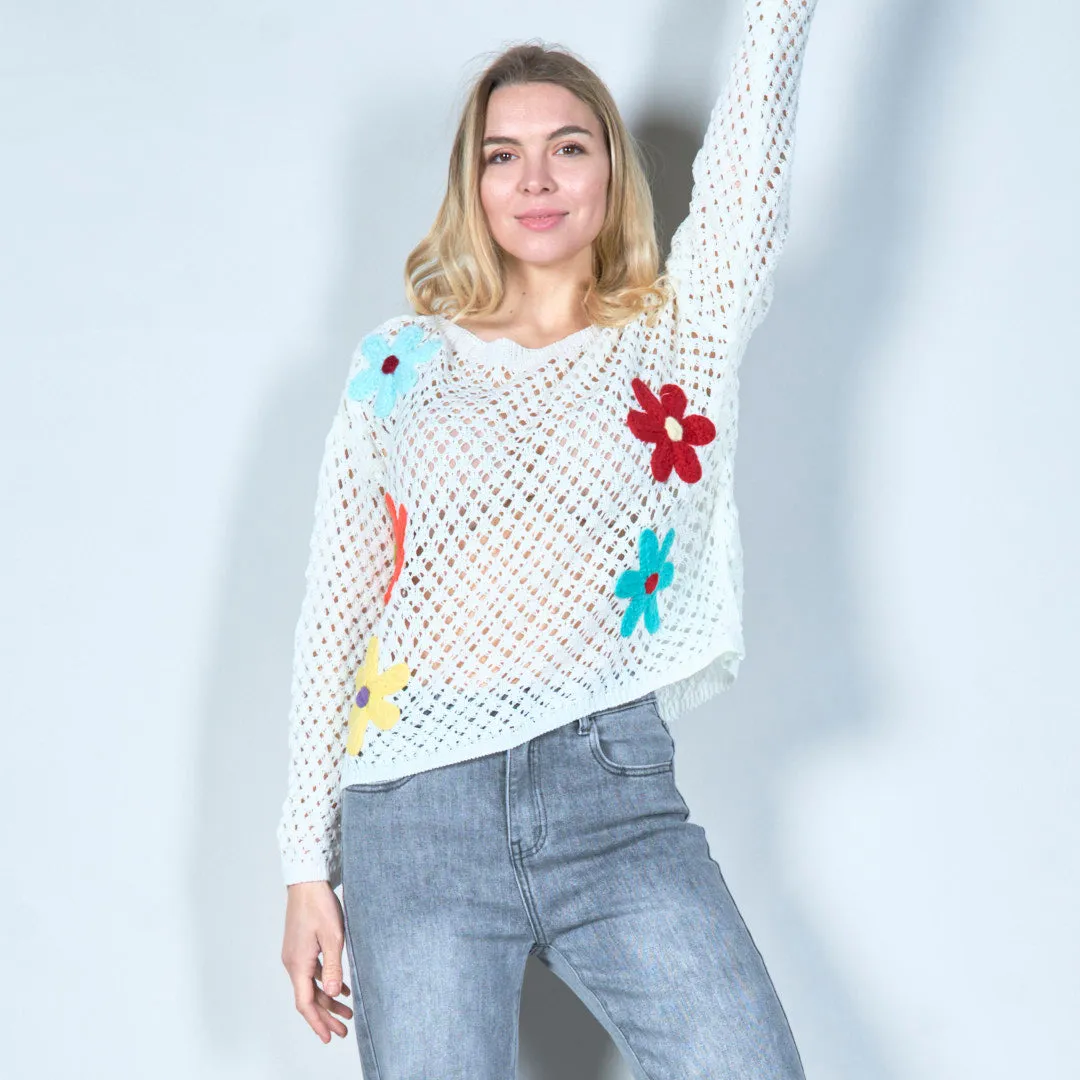 Open-knit sweater with colorful floral applique wholesale