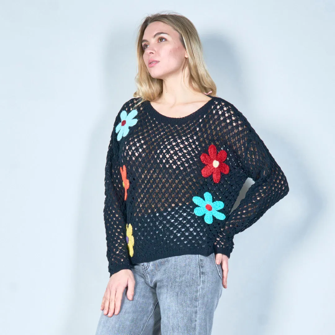 Open-knit sweater with colorful floral applique wholesale