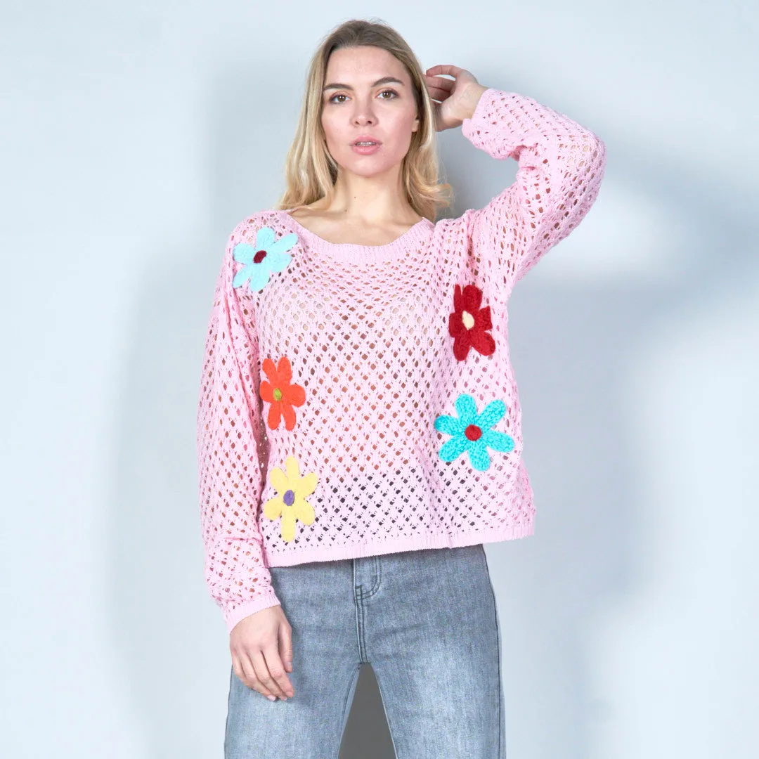 Open-knit sweater with colorful floral applique wholesale